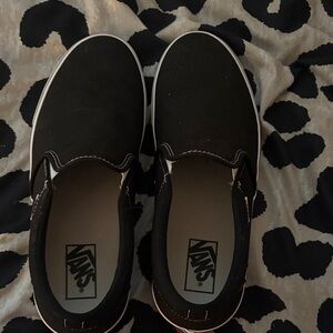 Vans Black Canvas Slip-Ons